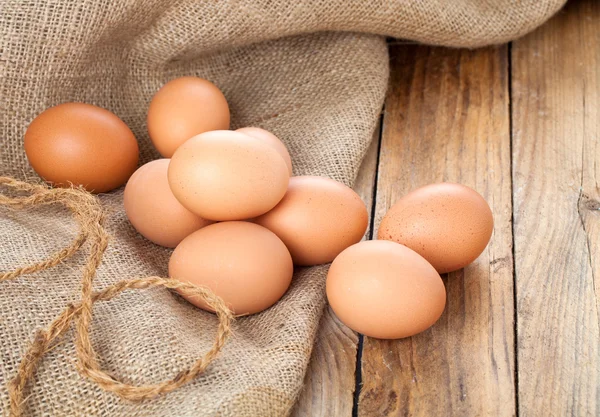 Eggs on wooden background — Stock Photo, Image