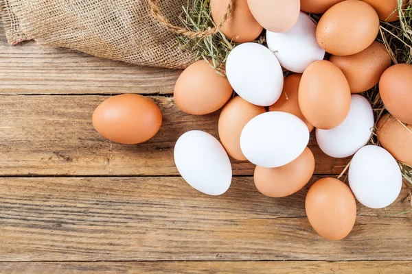 Eggs on wooden background — Stock Photo, Image