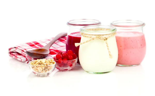 Delicious, nutritious and healthy yogurt in a glass jars with sp — Stock Photo, Image