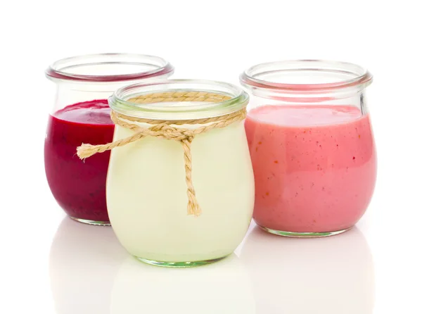 Delicious, nutritious and healthy yogurt in a glass jars on a wh — Stock Photo, Image