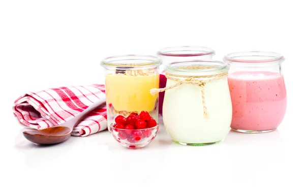 Delicious, nutritious and healthy yogurt in a glass jars with sp — Stock Photo, Image