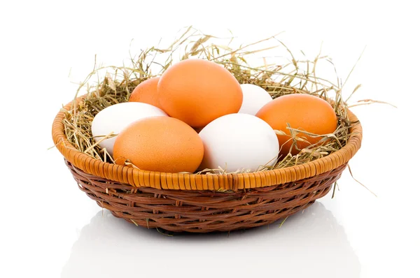 Eggs in basket isolated on white background — Stock Photo, Image