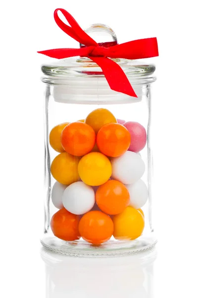 Colorful background of assorted Gumballs in  glass jar,  isolate — Stock Photo, Image