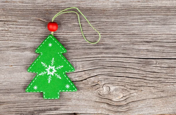 Рождественская елка на деревянном винтажном фоне — стоковое фото