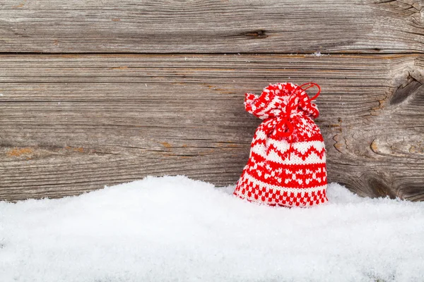 Christmas väska, presentkort över trä bakgrund — Stockfoto