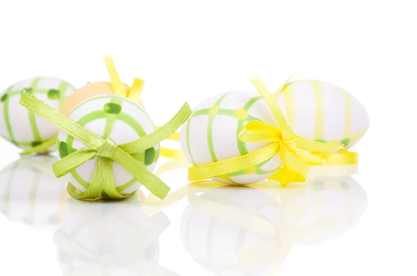 Close up of colorful easter eggs, on white background — Stock Photo, Image