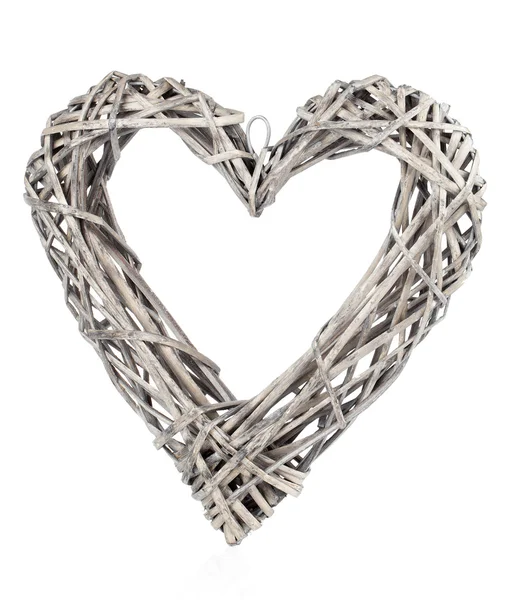 Heart shaped decoration made of wood, over white background — Stock Photo, Image