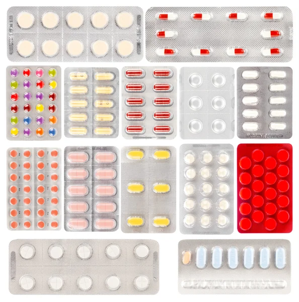 Set of pills in a plastic blister package, on white background — Stock Photo, Image