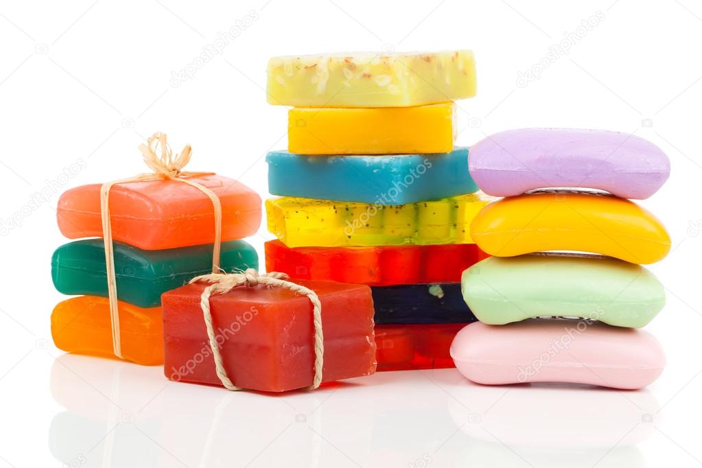 Stack of new colorful Soap Bars on white background.