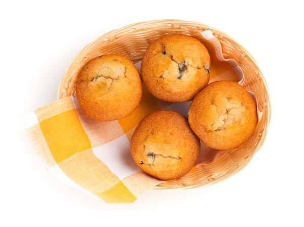 Fresh muffins on white, top view — Stock Photo, Image