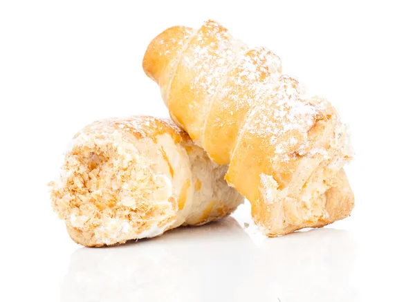 Puff rolls with cream on white background — Stock Photo, Image