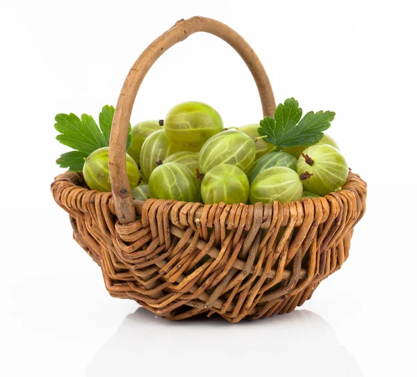 Fresh gooseberry in a wicker basket, on a white backgroun — Stock Photo, Image