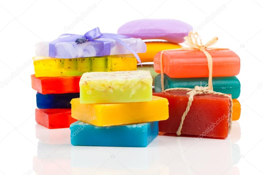 Stack of new colorful Soap Bars on white background.