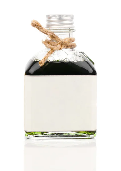 Una bottiglia di olio da bagno doccia (bagno di alghe, infusi di erbe) isola — Foto Stock
