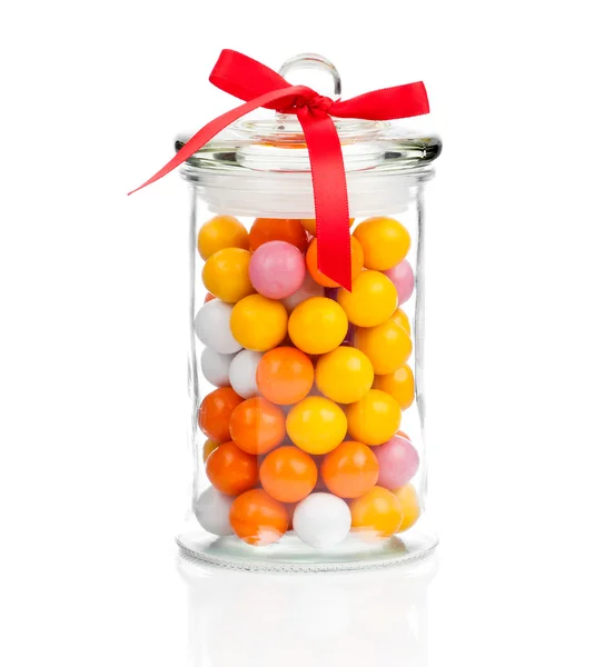 Gumballs in glass jar, over white background — Stock Photo, Image