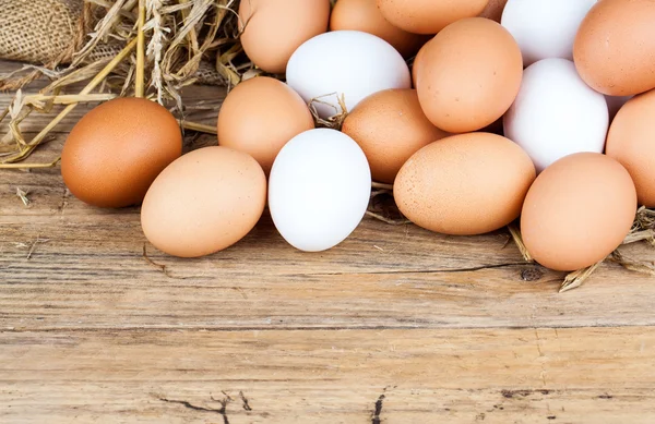 Eggs on wooden background — Stock Photo, Image