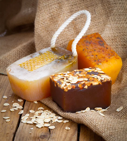 Honey handmade soap, on wooden background — Stock Photo, Image