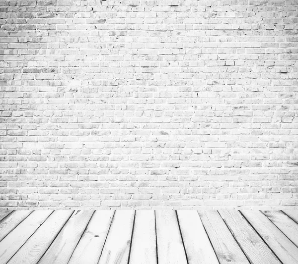 Interior room with white brick wall and wooden floor — Stock Photo, Image