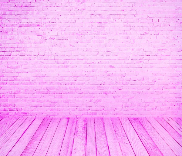 Pink brick wall background with wooden floor — Stock Photo, Image