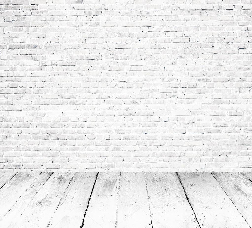 Interior room with white brick wall and wooden floor Stock Photo by