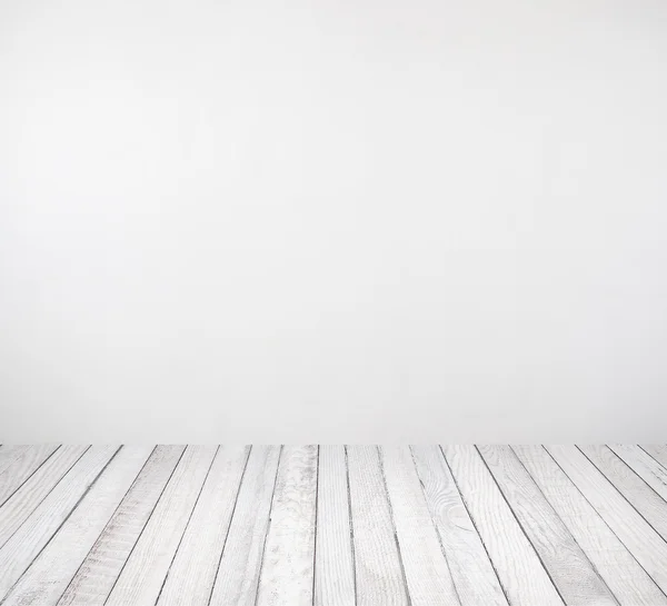 Habitación interior con pared blanca y suelo de madera — Foto de Stock