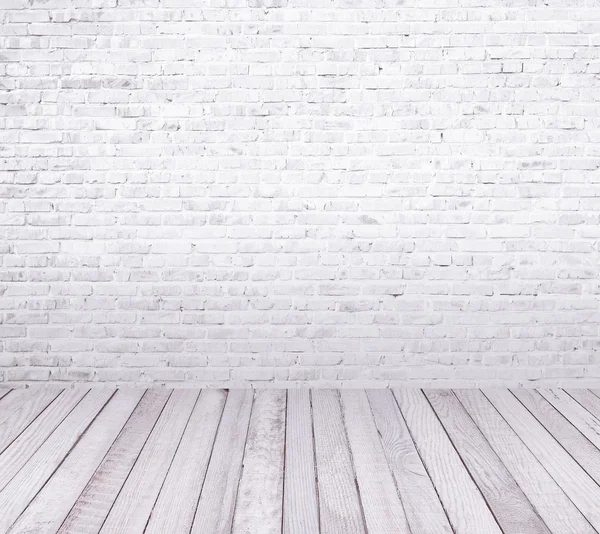 Interieur kamer met witte bakstenen muur en houten vloer — Stockfoto