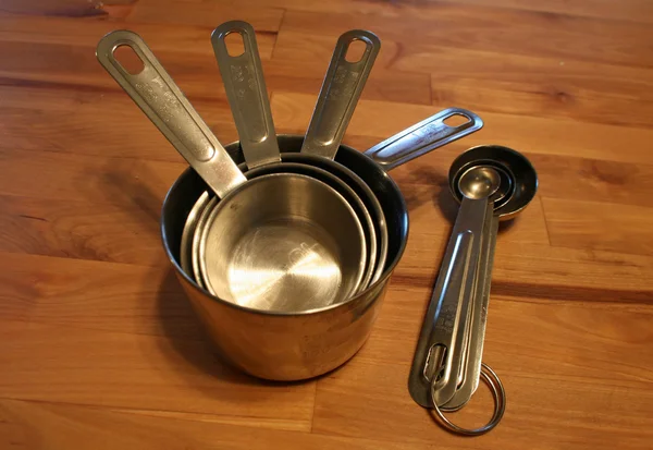 Tazas y cucharas — Foto de Stock