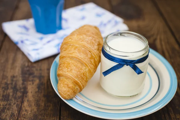 yogurt, coffee and croissant