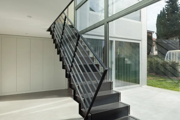 Hall with iron staircase — Stock Photo, Image