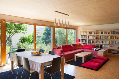 yemek masası ve kırmızı divan 