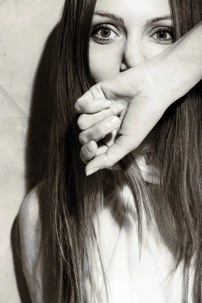 Young Woman Covers Her Mouth Her Arm While She Laughs — Stock Photo, Image