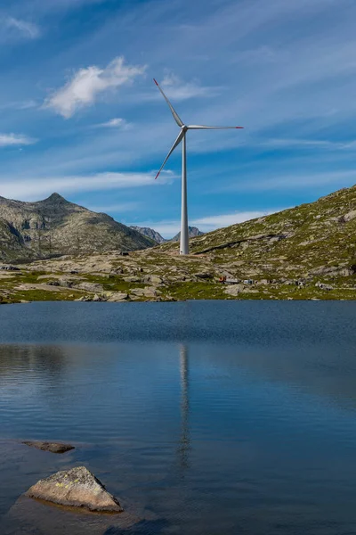 Wind Turbine Top Gotthard Pass Swiss Alps Reflected Water Lake — Stock fotografie