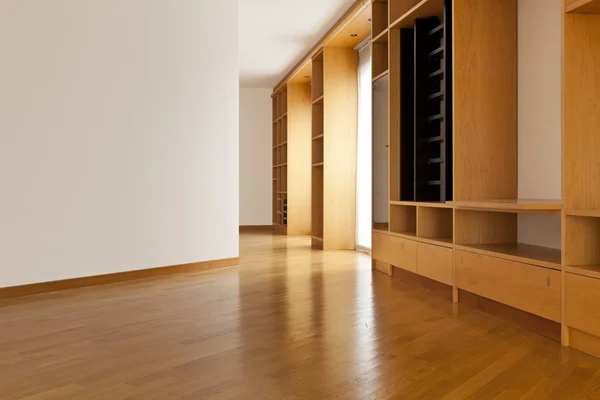 Wall cabinet in empty room — Stock Photo, Image