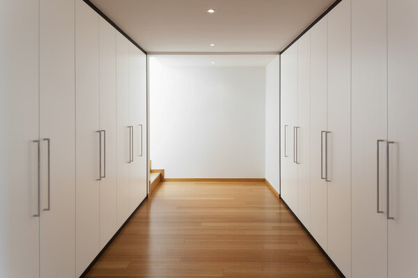 Interior, long corridor with wardrobes