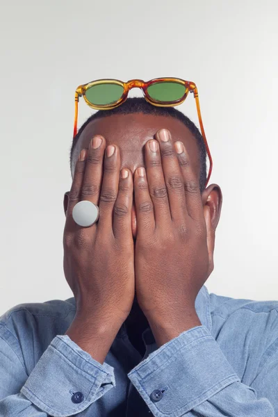 African boy hiding his face — Stock Photo, Image