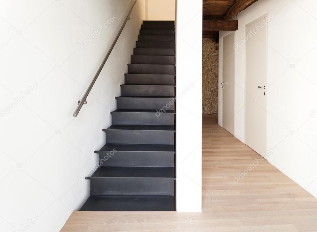 Empty corridor, modern black staircase