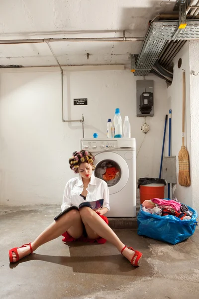 Housewife bored in the laundry — Stock Photo, Image