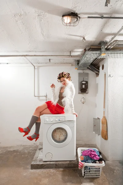 Housewife bored in the laundry — Stock Photo, Image