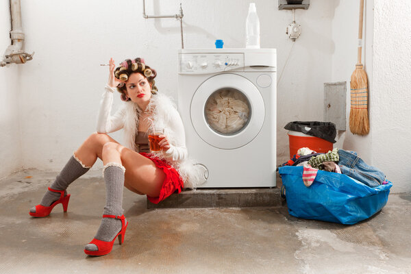 housewife bored in the laundry