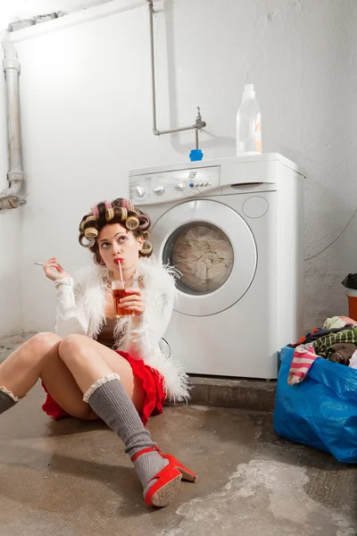 Housewife bored in the laundry — Stock Photo, Image