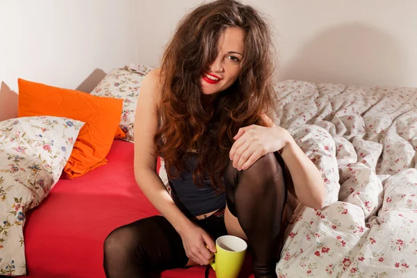Girl in lingerie wakes up after night of partying — Stock Photo, Image