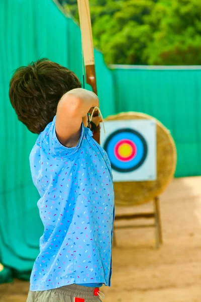 Niño con un lazo — Foto de Stock