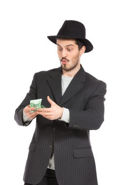 adam şapka ve para