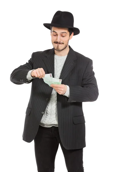 Man with hat and money — Stock Photo, Image