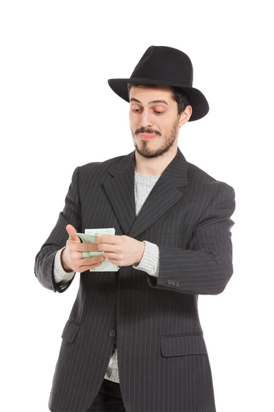 Man with hat and money — Stock Photo, Image