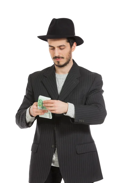 Man with hat and money — Stock Photo, Image