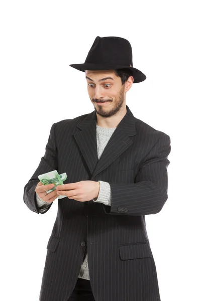 Man with hat and money — Stock Photo, Image