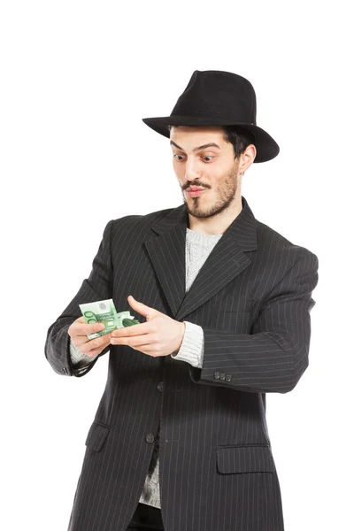 Man with hat and money — Stock Photo, Image