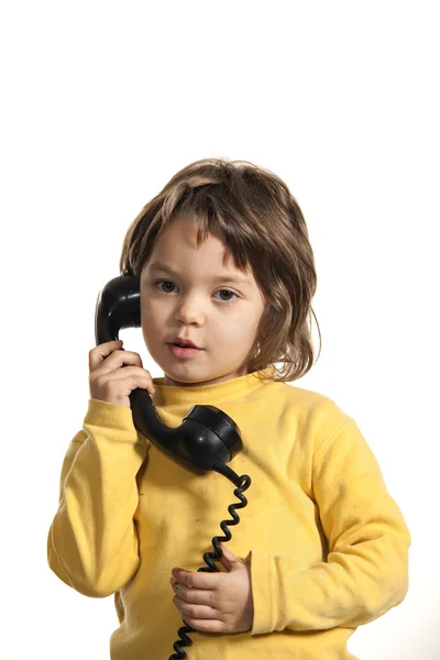 Petite fille avec téléphone — Photo