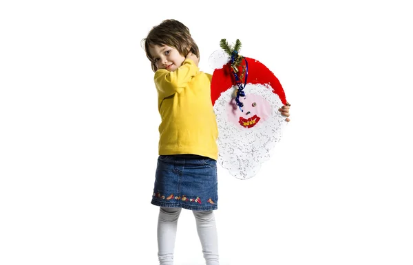 Little girl in studio with Santa's face — Stock fotografie